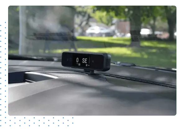One Step GPS AI dash camera mounted on a car dashboard