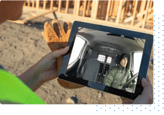 Worker watching One Step GPS AI dash cam footage on a tablet